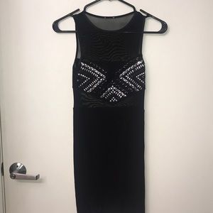 Black nylon detailed gem dress.